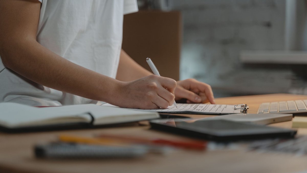 Marketer working through a landing page conversion optimisation checklist